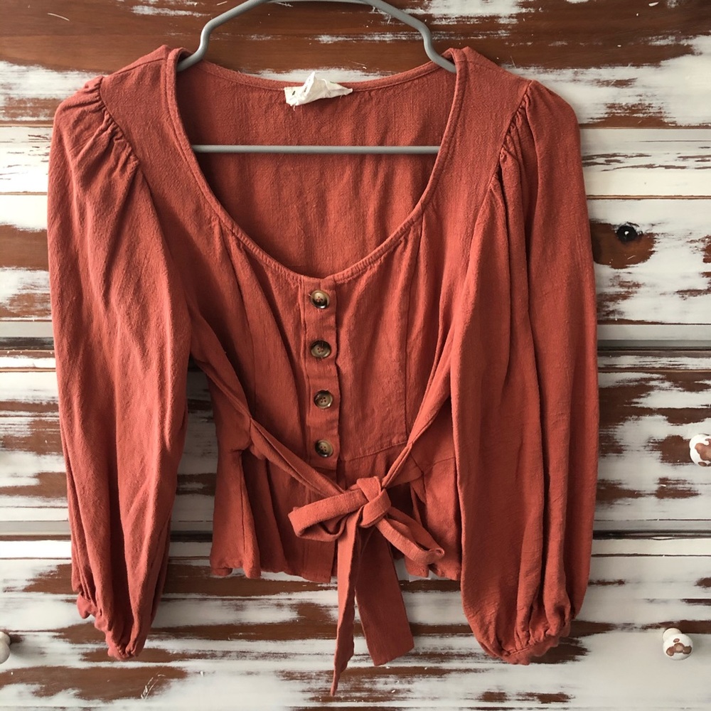 Button up peplum top with front tie